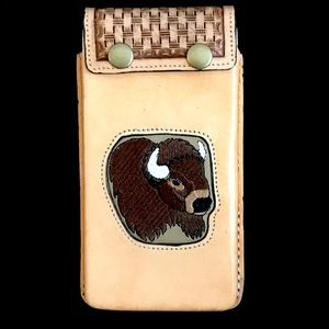Handmade all leather cell phone carrier with belt loop.